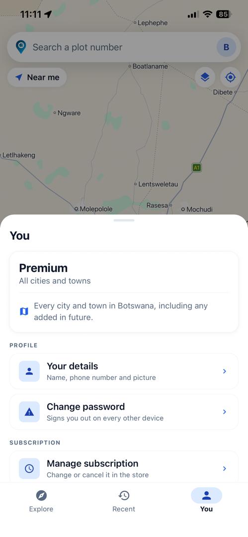 The account sheet showing a Premium plan covering all cities and towns, with rows for profile details, password and managing the subscription.
