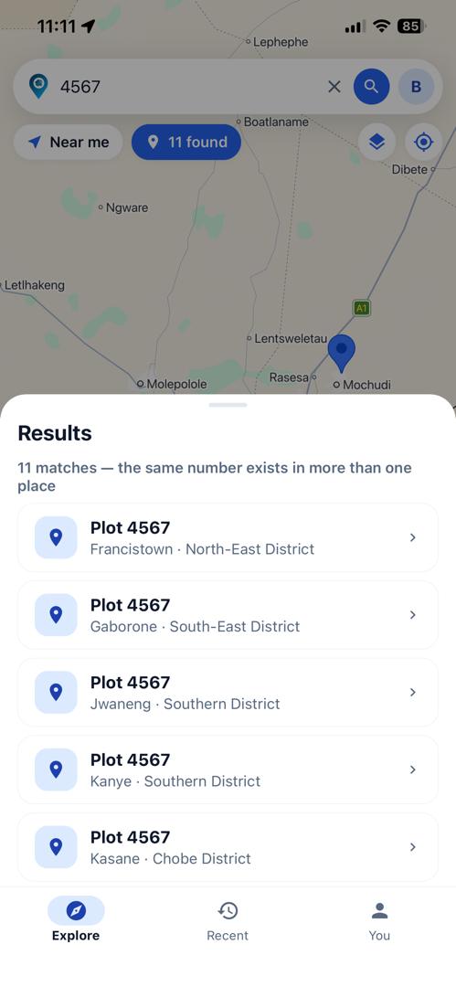 A search for plot 4567 with the results sheet up: 11 matches, the same number in more than one place, listed as Plot 4567 in Francistown, Gaborone, Jwaneng, Kanye and Kasane, each with its district.